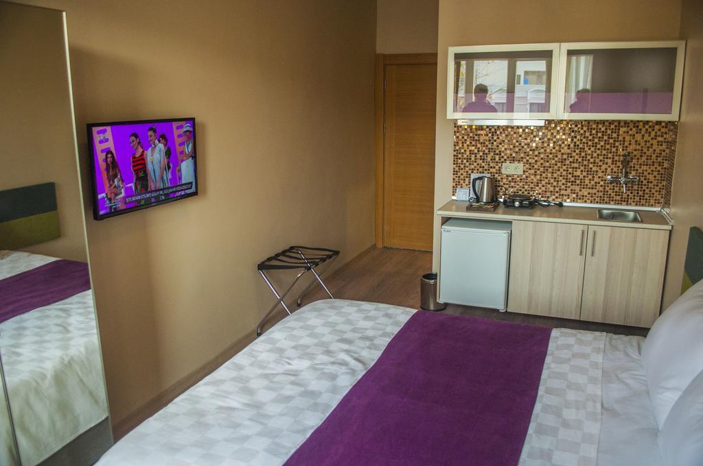 Apart 57 Taksim Harbiye Istanboel Kamer foto